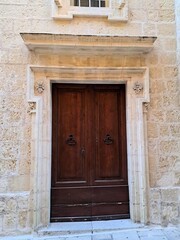 Fototapeta na wymiar Old wooden door in a Medieval Village