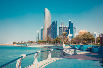 Downtown Abu Dhabi with sea and skyscrapers. Sunny summer in UAE