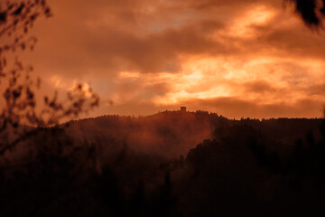 Spooky landscape, Furnas, Azores islands, mystical mountains with trees and fog. 