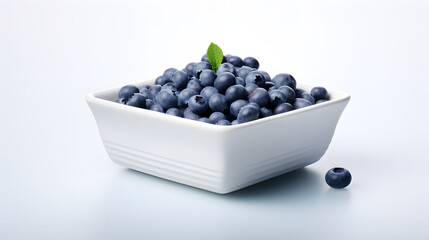 Bowl with full of blueberries inside in a white background