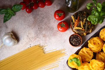 Obraz na płótnie Canvas ingredients for making pasta - tomatoes, basil, garlic