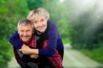 Portrait of a beautiful old couple in the park.