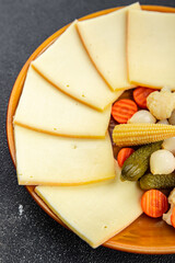 raclette cheese meal vegetable snack eating cooking appetizer meal food snack on the table copy space food background rustic top view