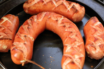 a ring of Lyon sausage from the grill