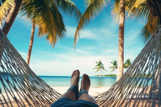 Feet visible from hammock beach holidays or relax