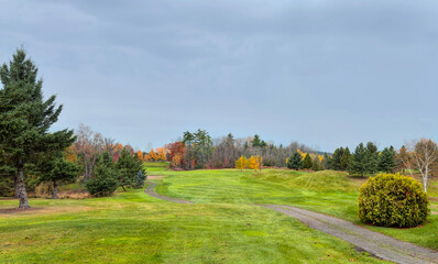 Fototapeta na wymiar A beautiful golf course on a cool cloudy autumn day in Canada