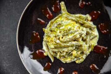 green bean creamy sauce vegetable green pod legume vegetable eating meal food snack on the table copy space food background rustic top view