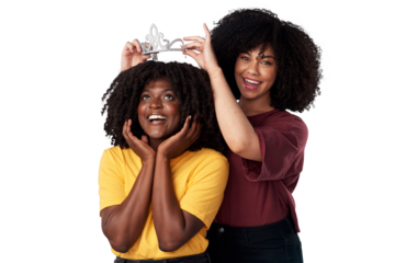 Women, crown and happy friends together for support, empowerment or freedom. Young, loyal and black people isolated on a transparent, png background for motivation, royalty and help for princess girl