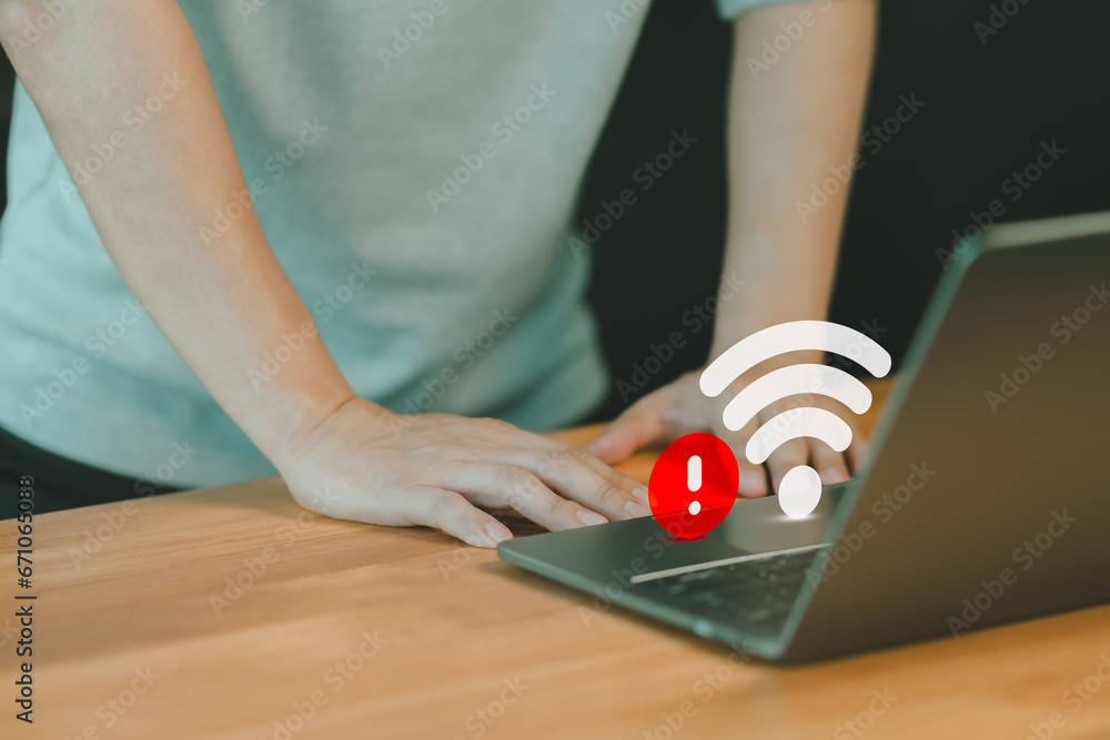 Poster Man using a laptop computer to connect to wifi but wifi not connected or password is incorrect and waiting to loading digital data form website. Technology concept of wifi connected but no internet.