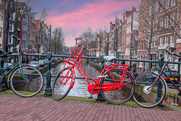 Fototapeta premium City scenic from Amsterdam in the Netherlands at sunset