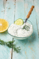 Delicious traditional Greek tzatziki sauce, vertical photo.