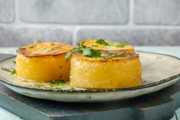 Fondant potatoes, tender potatoes close-up, melted potatoes