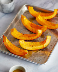Roasted pumpkin squash on sheet pan