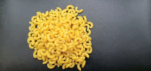 Raw pasta isolated vector. Raw pasta on a black background vector. Vector pasta background, wallpaper. Cooking pasta in the kitchen. Food wallpaper.