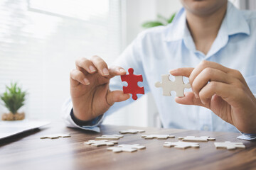 person hand connecting jigsaw puzzle pieces, business solutions, goals, success, goals and strategy...