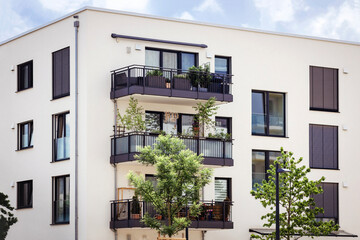 Modern Facade Building with  Modern Balconies of Multifamily Apartment Building. Newly Residential...