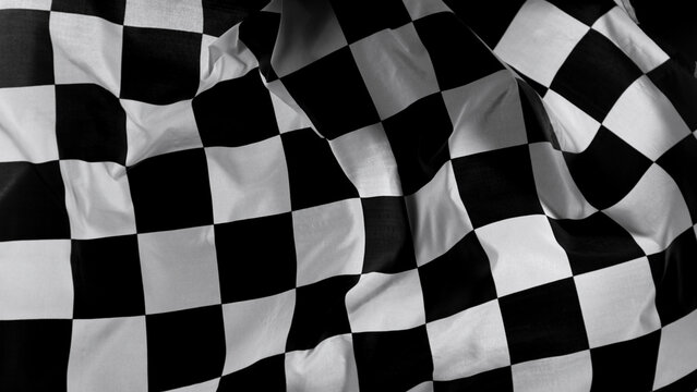 Checkered Race Flag. Freeze Motion Wavy closeup fabric fluttering Racing Flags background. Formula One flag car motor sport.