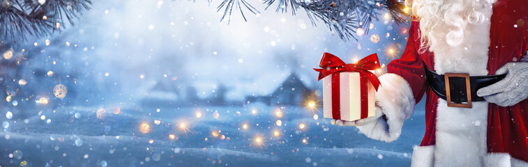 Christmas Present from Santa Claus. Winter Holiday Background - 671085475