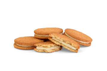 Pile of shortbread cookies with coconut filling isolated on white background.