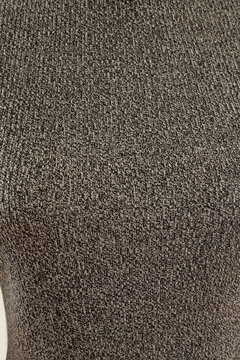 Close-up fabric texture detail. Quality gray heather material. 