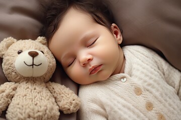 Obraz na płótnie Canvas Cute newborn baby sleeping with a teddy bear.