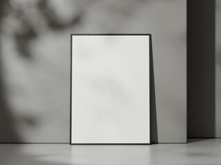 Blank poster with frame mockup on grey wall with shadow