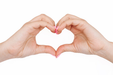 Close up of female hands showing a heart shape isolated on a white background. Sign of love, harmony, gratitude, charity. Feelings and emotions concept