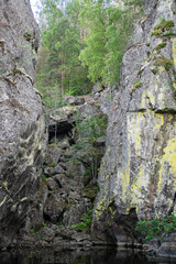 Ladoga Skerries Nature Reserve in summer. Rocky terrain, calm. The Cave in Marble