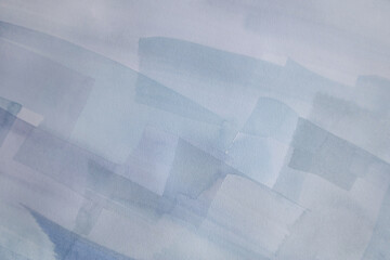 Simple pale blue wallpaper. Abstract implicit brush strokes texture. Neutral watercolor background.