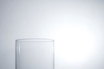 Empty glass on a gray background.