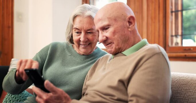 Relax, online and senior couple on sofa with phone, app or streaming a video on social media with internet. Reading, cellphone and people in retirement scroll news, website or post in living room