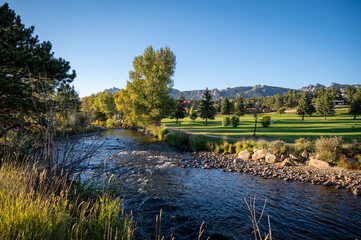 river with mountains in background