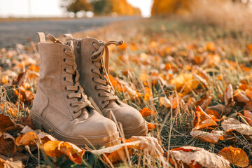 Autumn boots in the forest, style and fashion concept