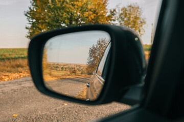 side rear-view mirror on a car - obrazy, fototapety, plakaty
