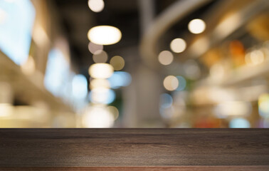 Empty wood table top and blur of out door garden background Empty wooden table space for text marketing promotion. blank wood table copy space for background