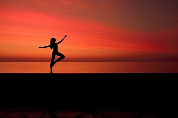 Woman practicing yoga on a concrete platform with a serene sea backdrop