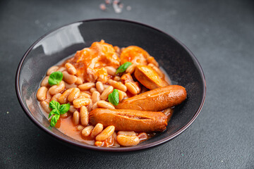 cassoulet thick bean soup with meat, beans, sausages delicious healthy eating cooking appetizer meal food snack on the table copy space