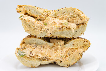 New York Style Everything Bagel Cut in Half with Spicy Cream Cheese