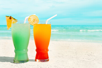Pair of fruit shakes on the tropical beach