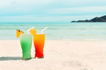 Pair of fruit shakes on the tropical beach