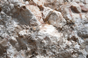 Close up shot of white cracked Marble stone. Wallpaper and background with copy space for text.