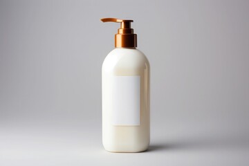 White detergent bottle with golden dispenser with blank white label - obrazy, fototapety, plakaty