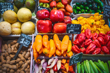 Close up, top view. Different multicolor vegetables on the counter at a Spanish bazaar.