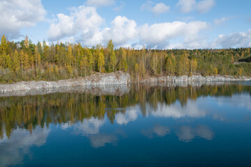 Golden autumn on the lake on the site of a old marble quarry. Ruskeala, Karelia. Russia