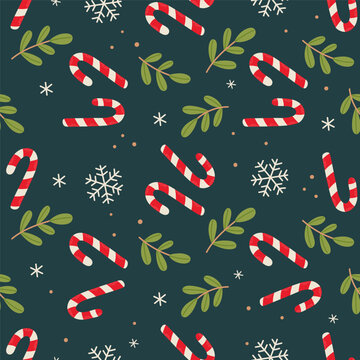 Seamless Christmas pattern with candy cane winter plants and snowflakes.