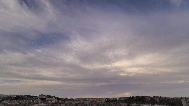 Cloudy sky over Rome during the sunset - Timelapse