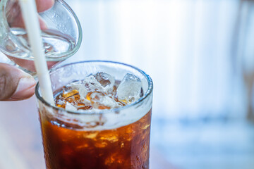 Black coffee, Americano in a cafe by the sea, Sue Flamingo, Ao Yon Beach, Phuket Thailand