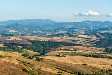 Beautiful tuscan landscape near Volterra, in the province of Pisa, Tuscany, Italy. - obrazy, fototapety, plakaty