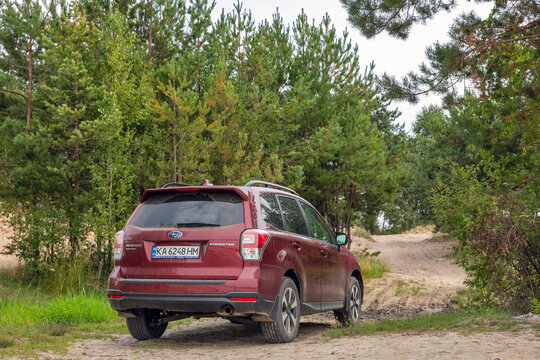 SUV Subaru Forester in a forest sand pit. Varash, Ukraine.