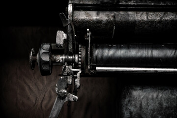 Rotary mechanism of an old typewriter. Abandoned typewriter.